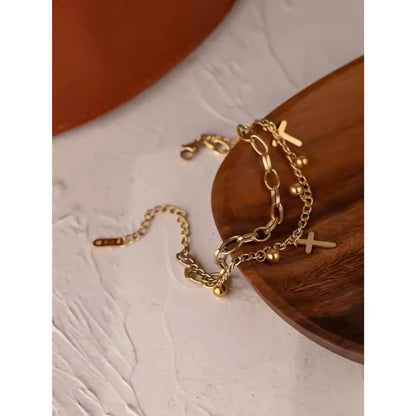 Pulseira Feminina com Cruz em Aço Inoxidável Banhada a Ouro 14K