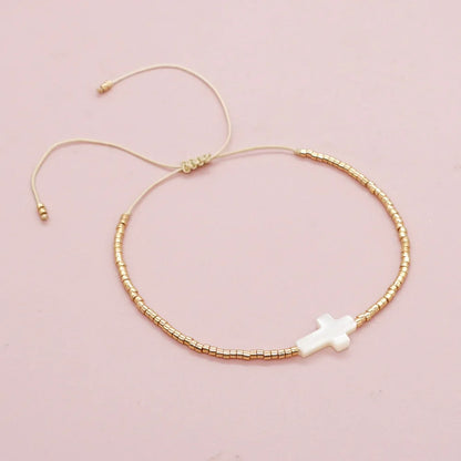 pulseira com cruz