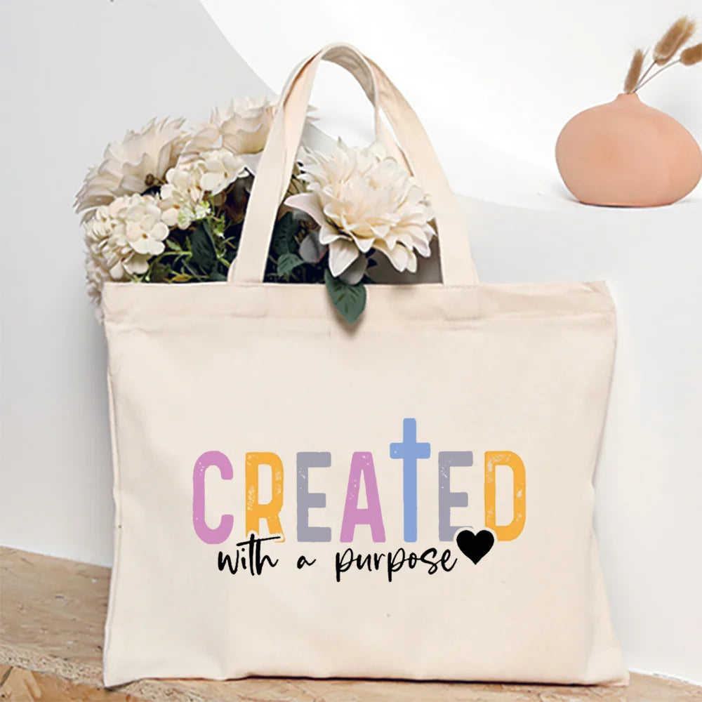 Bolsa Feminina de Lona com Estampa Cristã e Zíper