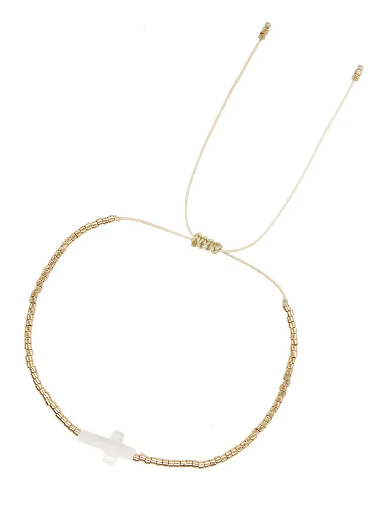 pulseira com cruz
