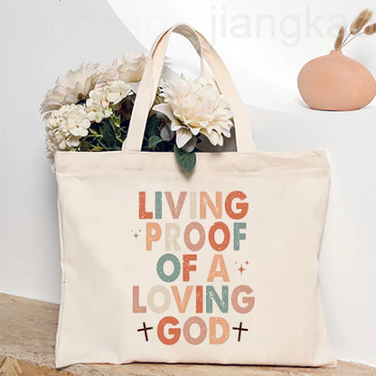 Bolsa Feminina de Lona com Estampa Cristã e Zíper