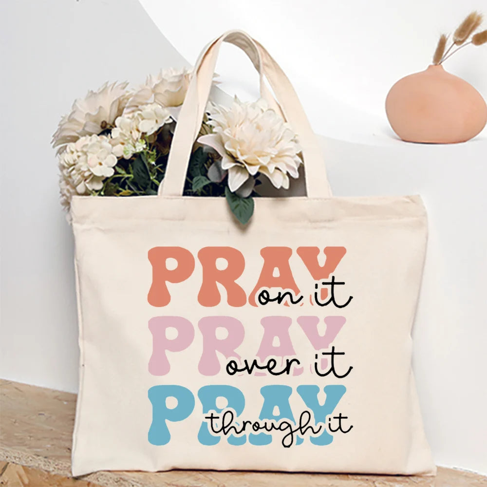 Bolsa Feminina de Lona com Estampa Cristã e Zíper