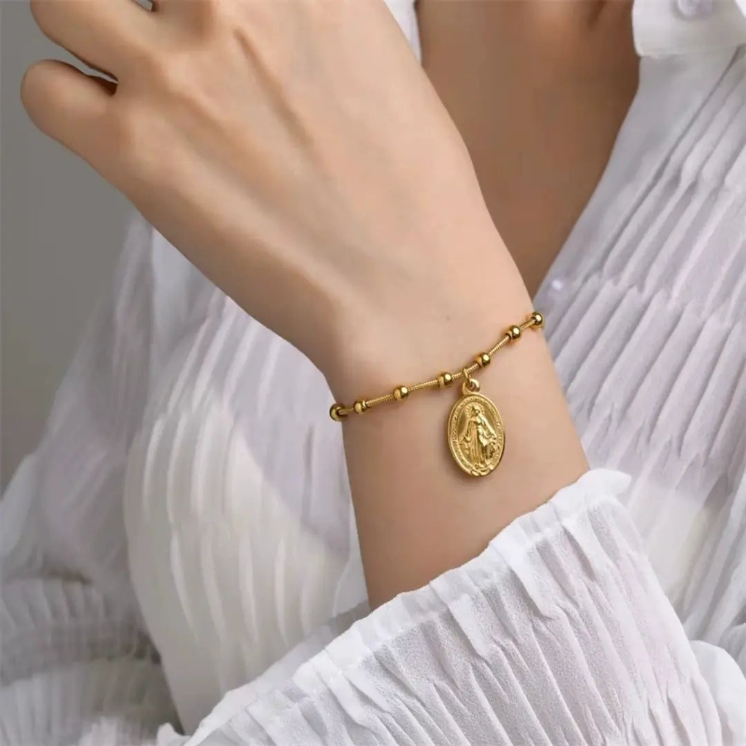 pulseira catolica feminina dourada